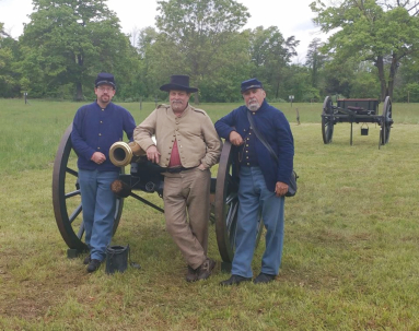 Confederate Prisoner Bob Crickenberger with Federal Guards by Cannon